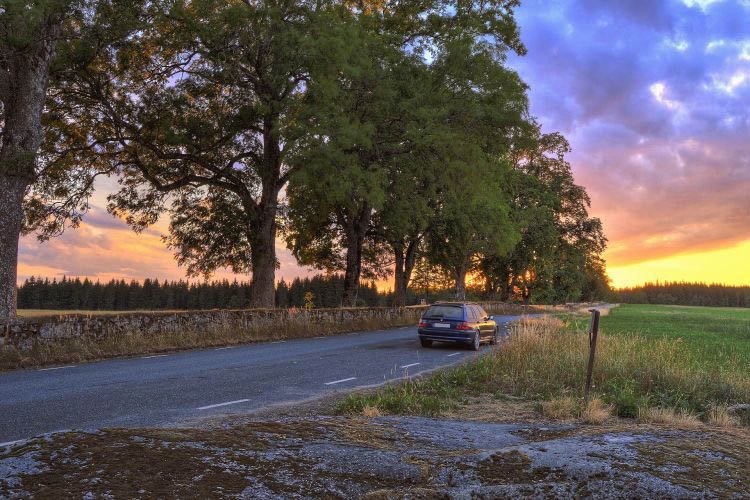 Sonnenuntergang Mietwagen Strasse
